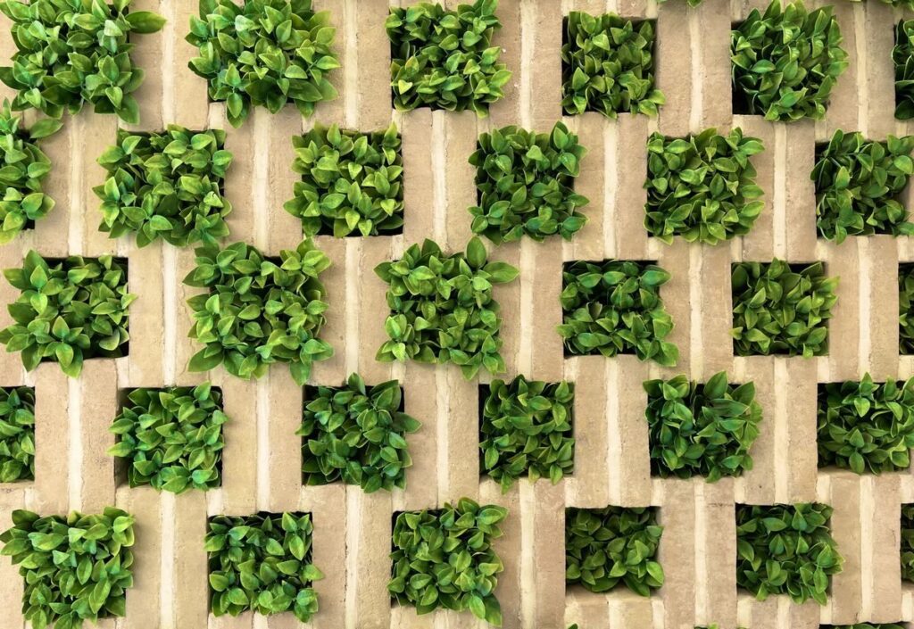 A creative vertical garden wall in Isfahan, showcasing lush greenery.